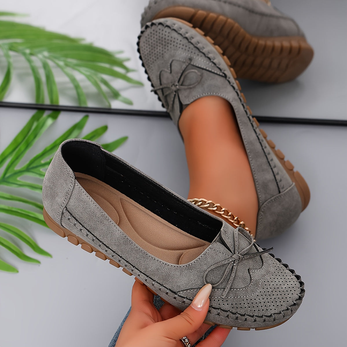 Versatile, breathable women's orthopedic slip-ons with soft soles.