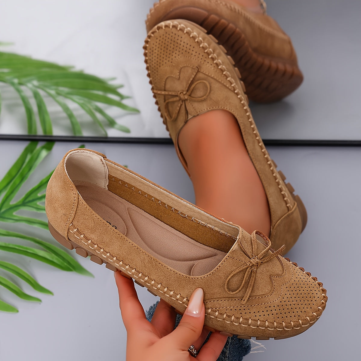 Versatile, breathable women's orthopedic slip-ons with soft soles.