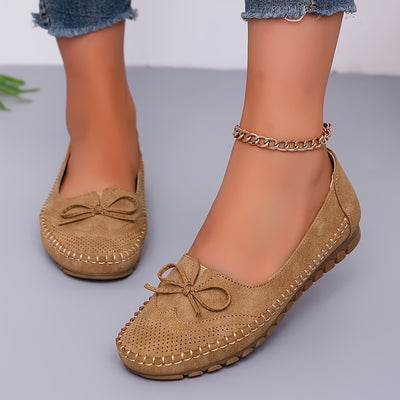 Versatile, breathable women's orthopedic slip-ons with soft soles.